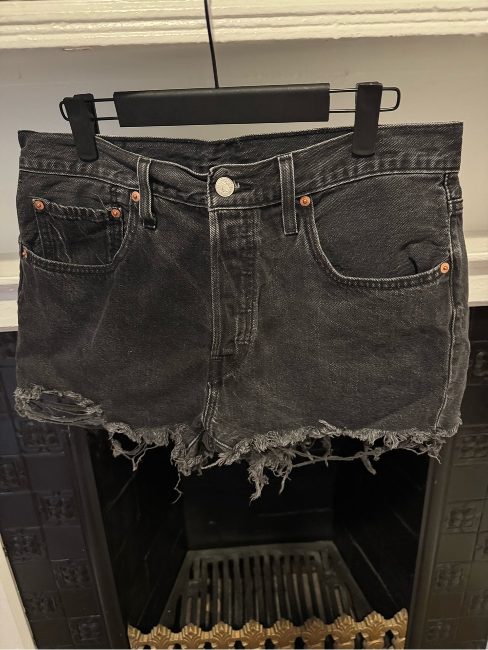 Levi’s Black Distressed Denim Cutoff Shorts